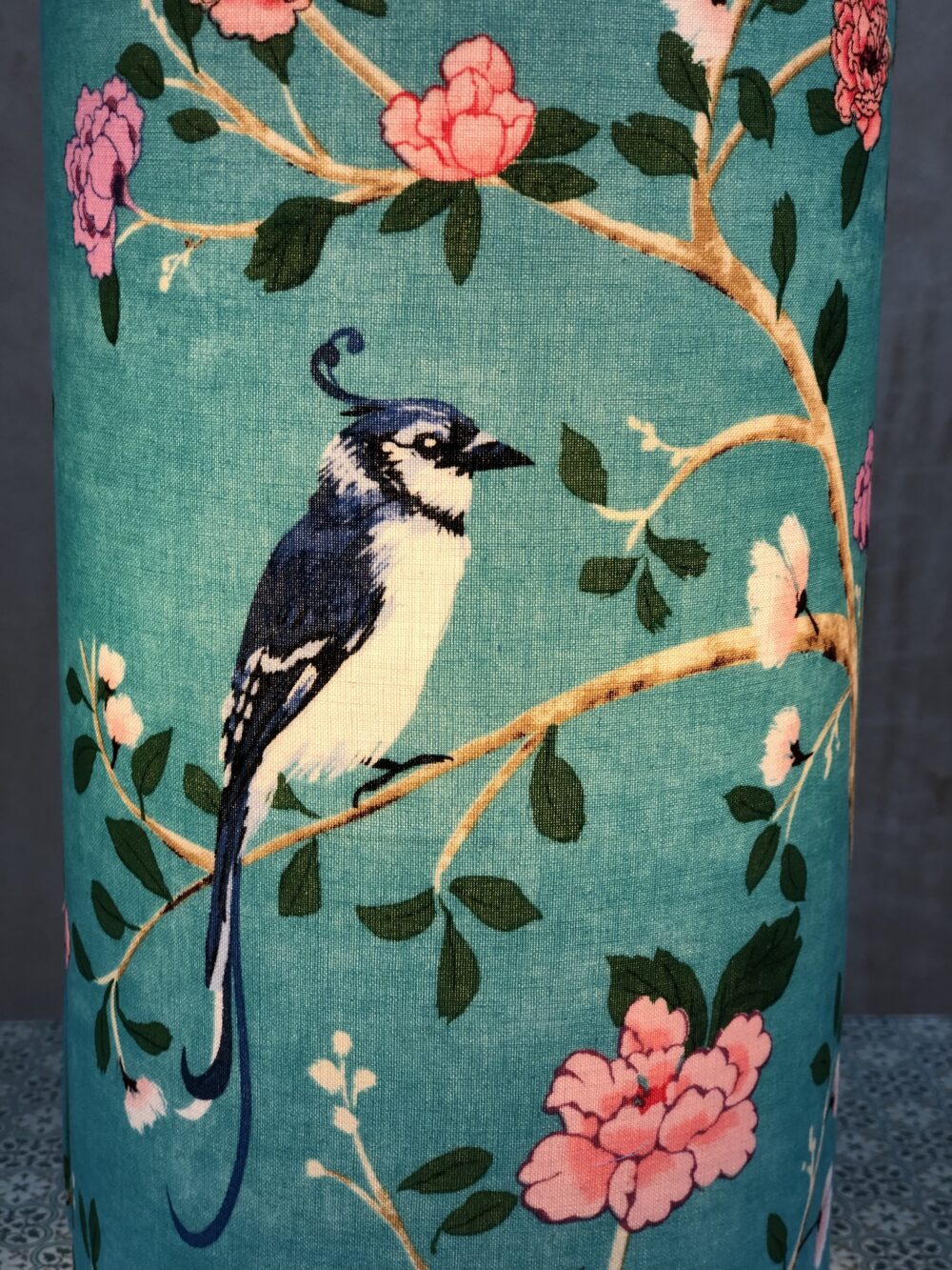 *close up of tall turquoise chinoiserie lamp