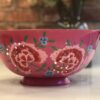 *bright pink enamelware colander