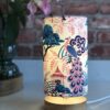 *pink and blue chinoiserie peacock and pagoda lamp with wooden base