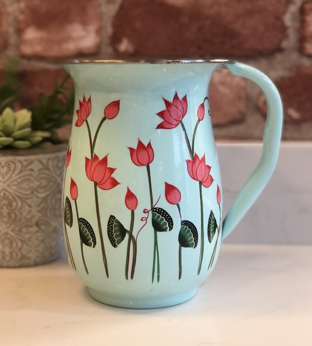*pale mint green enamelware jug with lotus flower