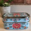 *pale blue metal lunchbox with flowers