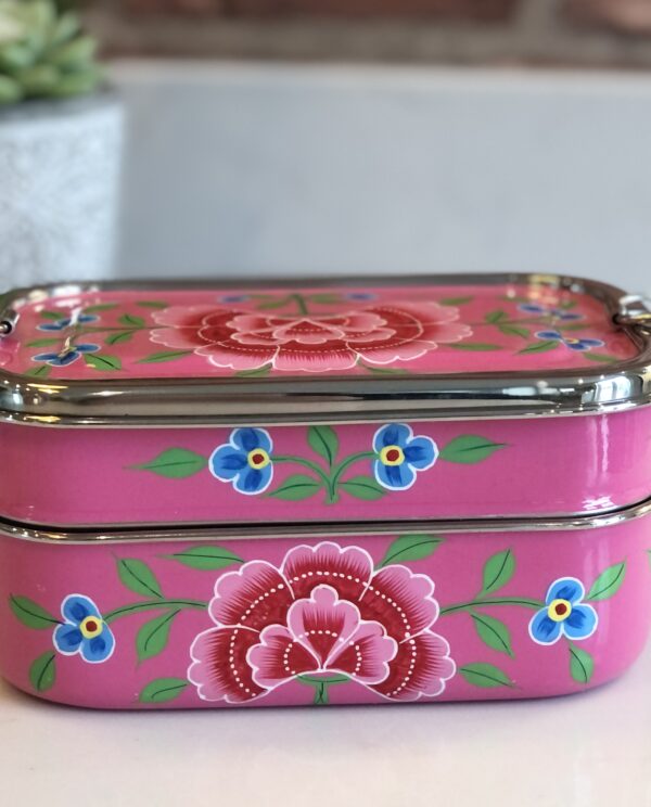 *bright pink metal lunchbox with flowers